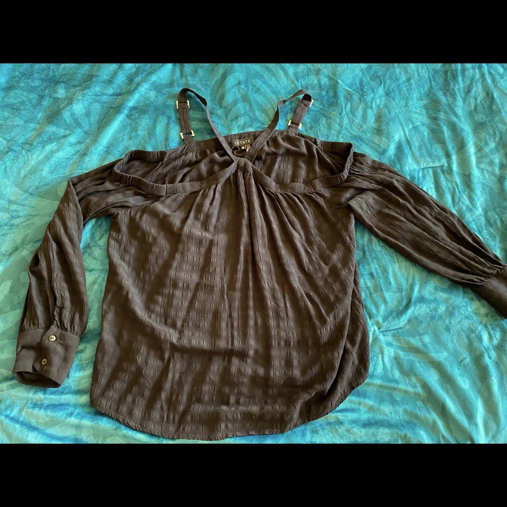 Woman’s black blouse